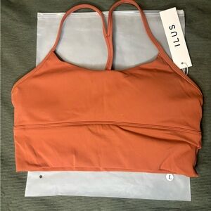 ILUS sports bra. Size L. New condition